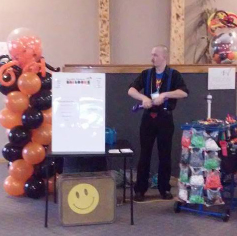 TJ making balloon animals